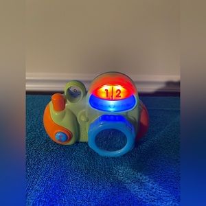 Toddlers Light Up Musical Camera Hap-P-Kid 2010-Works! Near Perfect Condition.